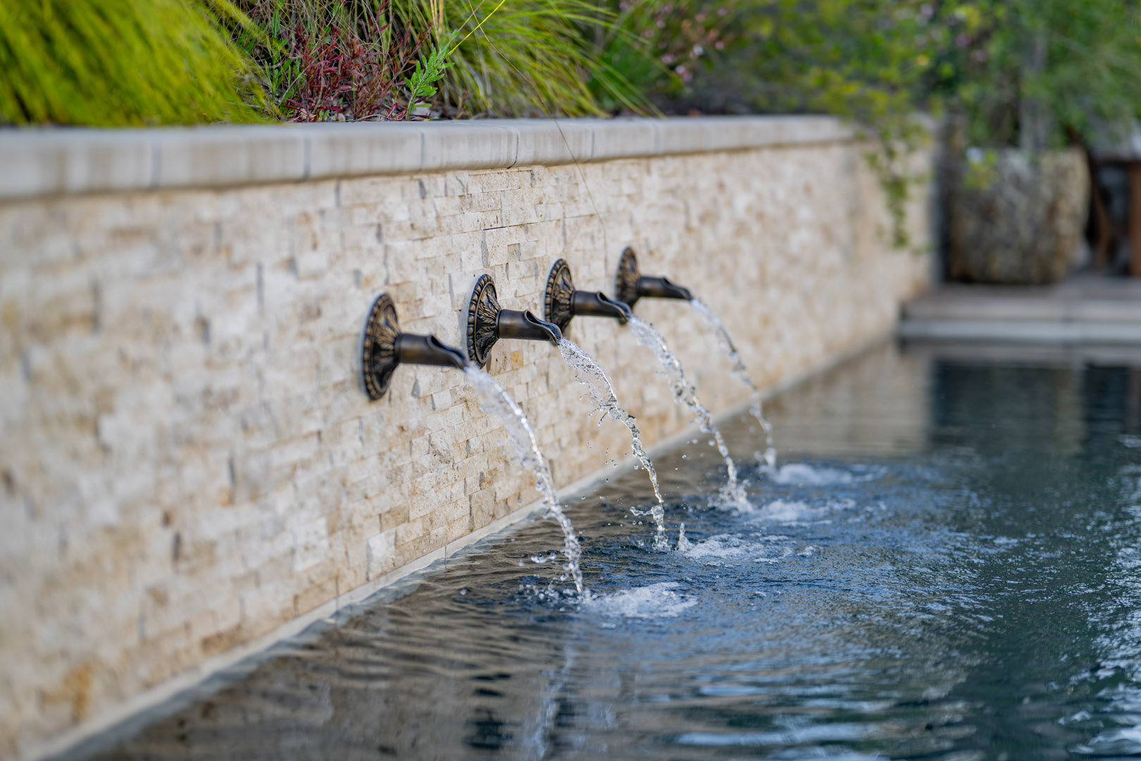 Lincoln Outdoor Living Spaces design with Water Features